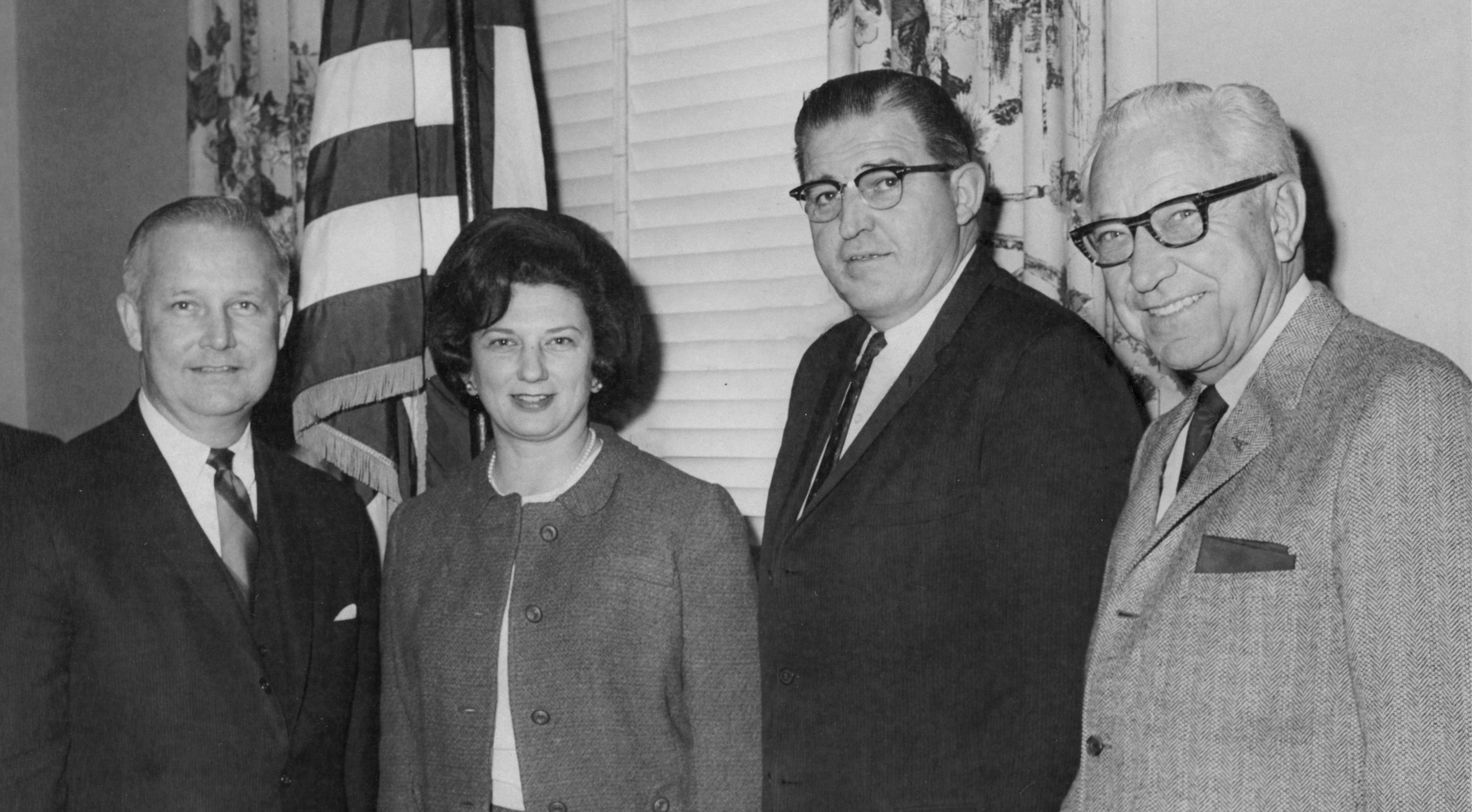 Arch Moore and Shelley Riley Moore married in 1949. She was an engaged political spouse and would later serve as First Lady of West Virginia for three terms, championing issues related to mental health, education, and libraries. Congressman Arch Moore and his wife Shelley pose with two unidentified men in 1966.