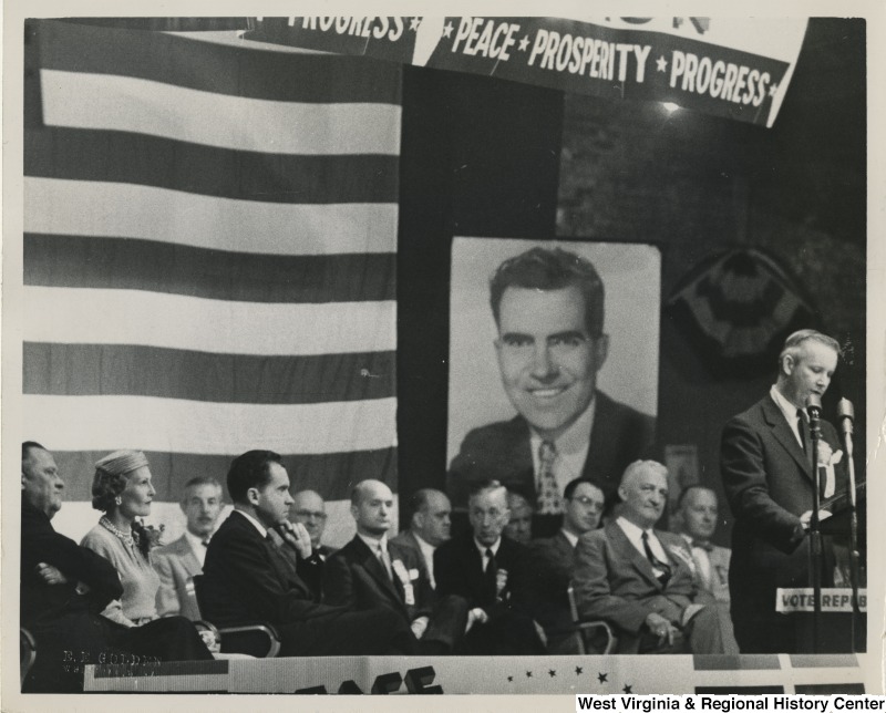 A photograph of Congressman Arch Moore speaking at a Nixon rally in Wheeling, West Virginia, as candidate for Vice President Richard Nixon looks on.