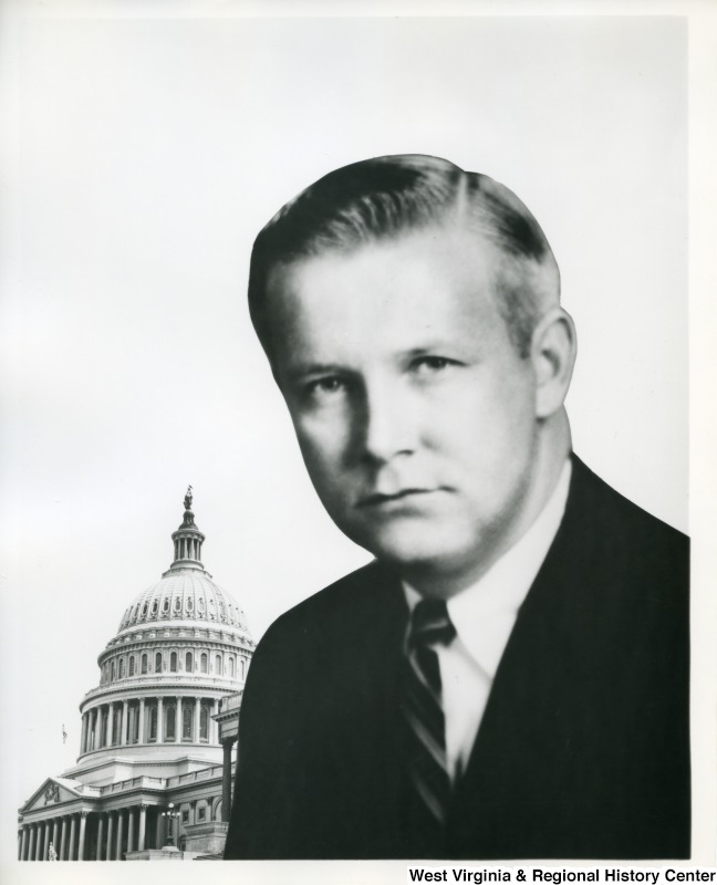 A head shot of Congressman Arch Moore, Jr. with the Capitol building in the background.