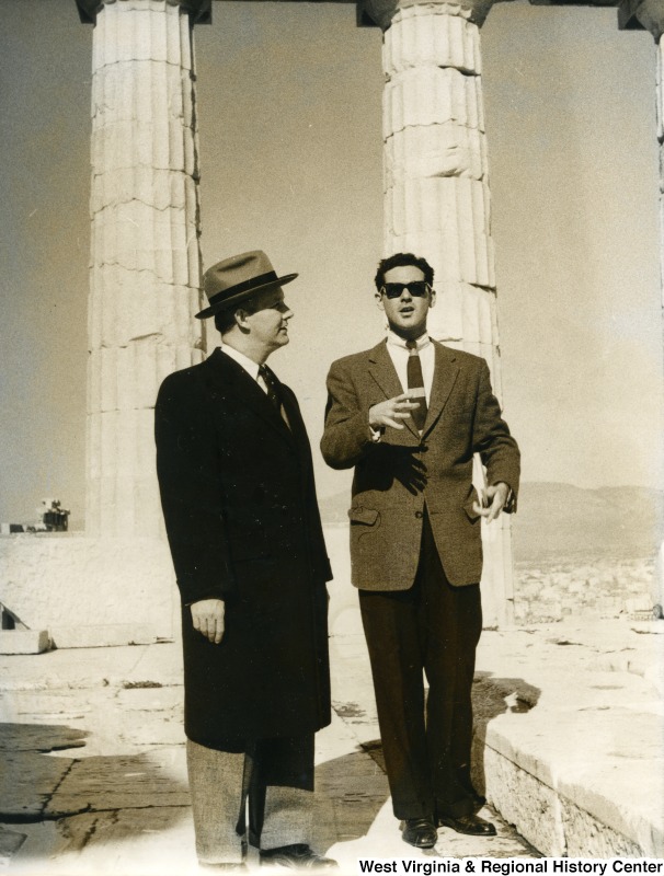 Congressman Arch A. Moore, Jr. talking with an unidentified man in sunglasses. They are standing in the Parthenon