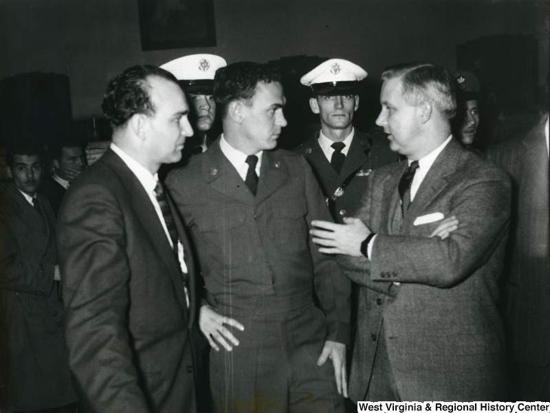Congressman Arch Moore Jr. in Greece for the trial of U.S. Airman Marion Musilli of Benwood, West Virginia.  Some officers can be seen standing behind Moore.
