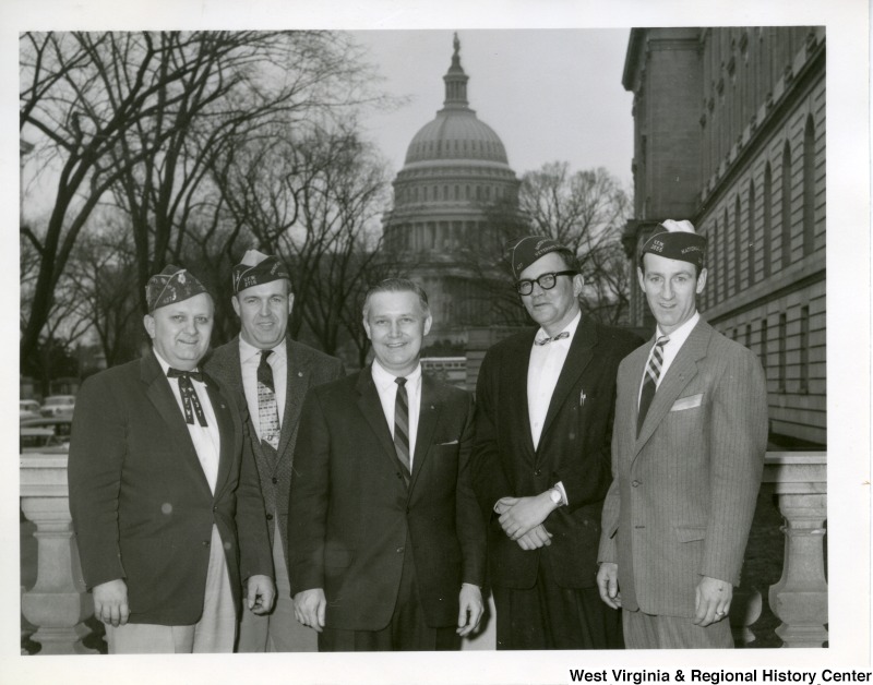 Congressman Arch A. Moore, Jr. (center) with four Veterans of Foreign Wars. The Capitol Building can be seen in the background.