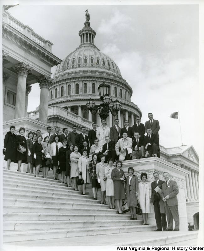 Twenty-five students from Bethany College, accompanied by J.G. Patterson, Director of the Falk Foundation Studies at the College, with Congressman Arch A. Moore, Jr. on the steps of the Captiol. The students were in Washington on their annual D.C. field trip.