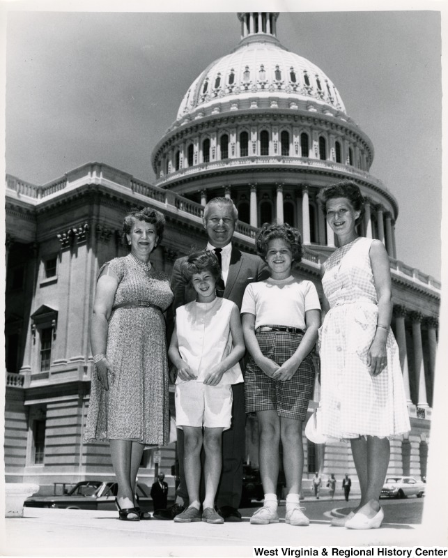 Congressman Arch A. Moore, Jr. standing in front of the Capitol with Miss Terry and Carol Hamm and two unidentified girls.