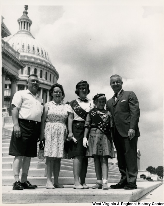 Congressman Arch A. Moore, Jr. on the steps of the Capitol with Thomas A. Cooper and his family. The girls are Girl Scouts in Troops 232 and 519.