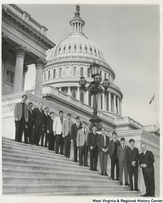 Congressman Arch A. Moore, Jr. standing on the steps of the Capitol with the Clarksburg DeMolay Chapter.