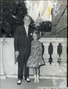 Congressman Arch A. Moore, Jr. with his daughter, Shelley. The Capitol Building can be seen in the background.