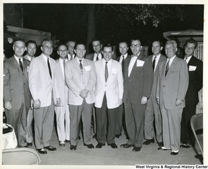 A large group of Republican representativesFront left to right: Congressman Arch A. Moore, Jr. (R - WV) , unknown, Congressman Robert Griffin (R - MI) , Congressman William Broomfield (R - MI), Congressman Donald Tewes (R - WI) , unknown, and Harold R. Collier (R - IL). The other congressmen are unidentified.