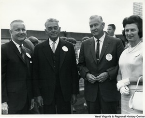 From left to right: Congressman Arch A. Moore, Jr., unidentified male, Edgar Tetrich, president; and Mrs. Shelley Moore.