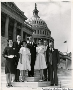 Congressman Arch A. Moore, Jr. on the steps of the Capitol with Miss Rose Lee Matthews, Miss Jorene Butcher, Mr. Richard Steven Hannah, Mr. Edwin Hill Chesapeake, Miss Mildred Fizer, and Mr. C. P. Dorsey.  The group attended the annual National 4-H Conference which was held at the National 4-H Center in Washington, the week of April 20-26. Miss Matthews, was one of the four selected to attend.
