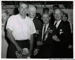 Congressman Arch A. Moore, Jr. standing with Frank Delligatti, Sergeant-at-Arms, and two other unidentified men during the Republican National Convention.