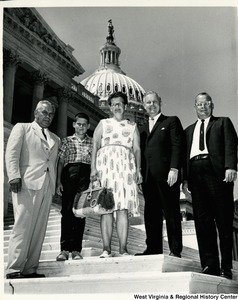 Congressman Arch A. Moore, Jr. on the steps of the Capitol with Mr. John Byard and family.