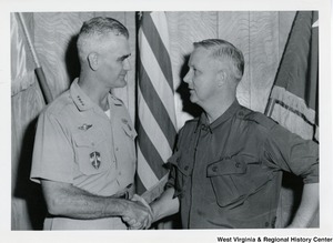 Congressman Arch A. Moore, Jr. shaking the hand of General William C. Westmoreland, commander of the U.S. Troops in Vietnam.