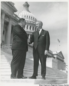 Congressman Arch A. Moore, Jr. shaking the hand of Andy Kondik, from Weirton, on the steps of the Capitol.
