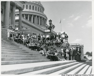 Congressman Arch A. Moore, Jr. standing on the steps of the Capitol with the Ohio County School Boy Patrol. Moore is standing beside Sisters Mary Merica and Mary Antonia of St. Ladislaus School. On the other side of Moore is Thomas Timbrook of the Wheeling Automobile Club, which sponsored the annual School Boy Patrol pilgrimage to Washington.