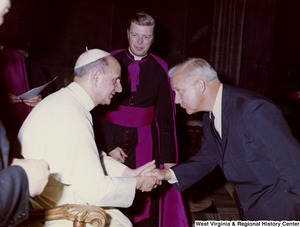 Congressman Arch A. Moore, Jr. shaking the hand of Pope Paul VI.
