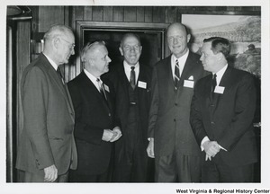 Congressman Arch A. Moore, Jr. with four unidentified men from the Bethany College.