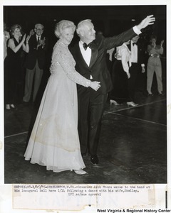 Governor Arch Moore waving to the band at his inaugural ball following a dance with his wife, Shelley.