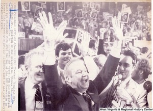 Governor Arch Moore throws his hands up in celebration after he announced the votes from his delegation put President Ford over the top of the GOP Convention in Kansas City.