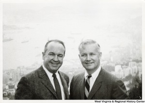 Governor Arch Moore standing with an unidentified man.