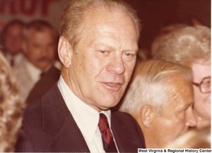 Gerald Ford (center) and Arch Moore (right) speaking to people during a campaign rally for Arch Moore.