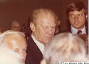 Gerald Ford speaking with attendees at Arch Moores campaign rally for governor.