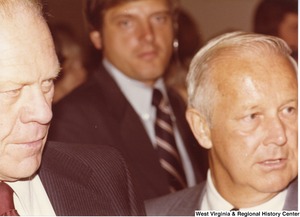 Gerald Ford and Arch Moore speaking with attendees at his campaign rally for governor.