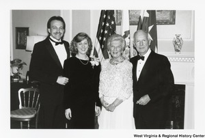 Governor Arch Moore (first on right) standing with his wife Shelley (second on right) and an unidentified man and woman.