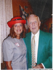 Arch Moore standing with an unidentified woman.