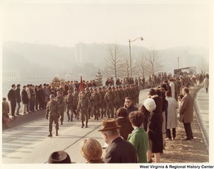A unidentified Army unit walking in Governor Arch Moores inauguration parade. sp